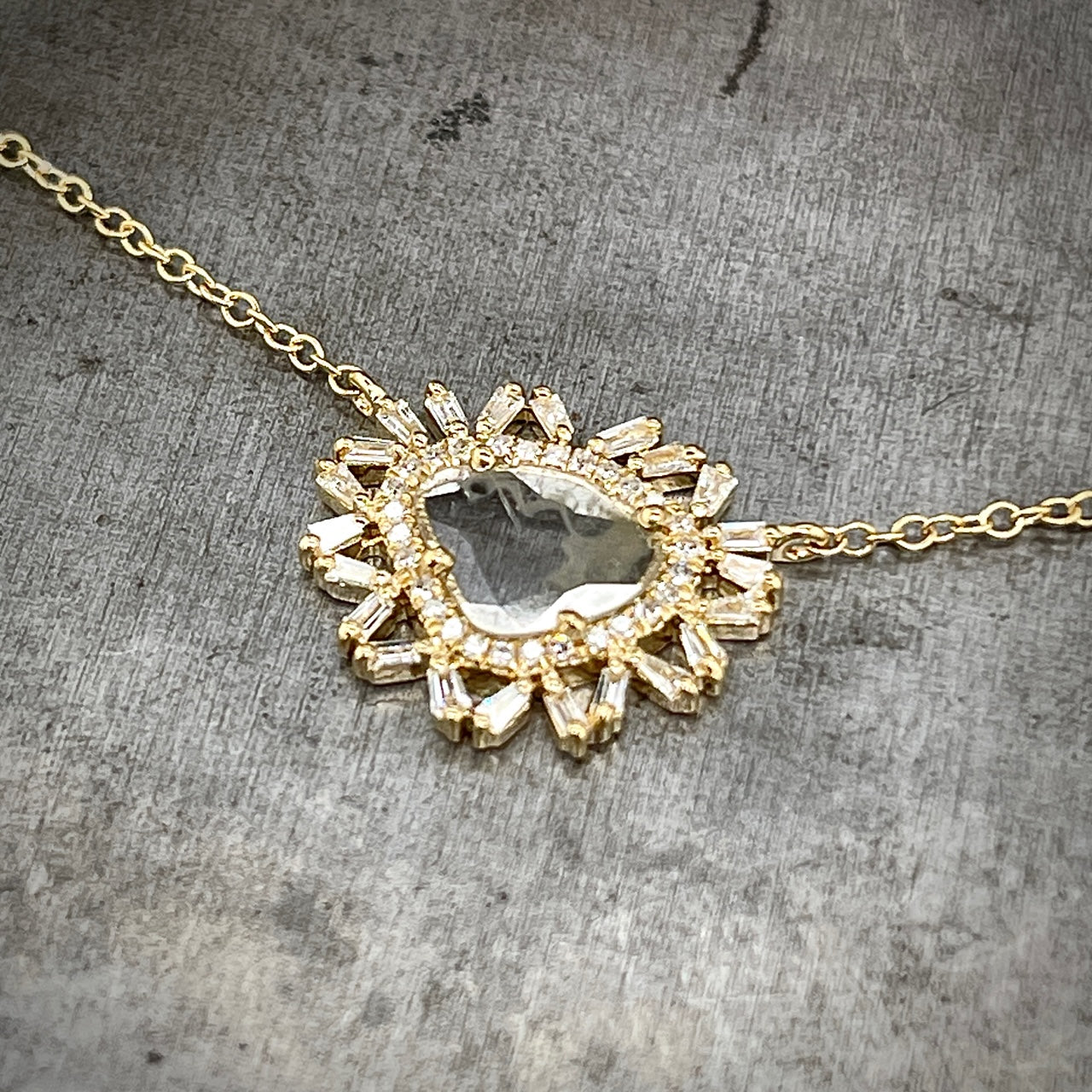 Angled View of 14k Yellow Gold Diamond Slice Halo Necklace