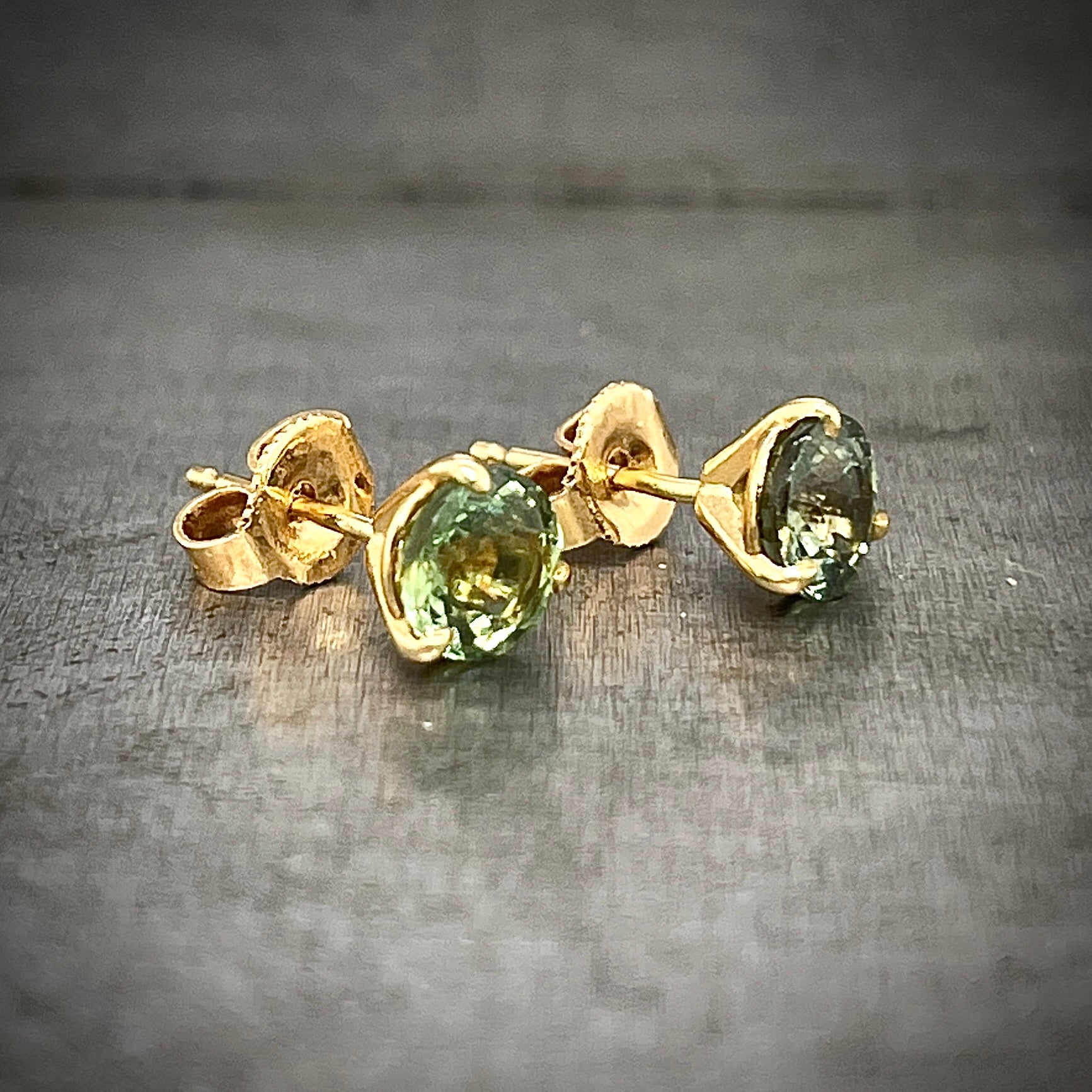 Side View of 14K Yellow Gold Green Sapphire Stud Earrings