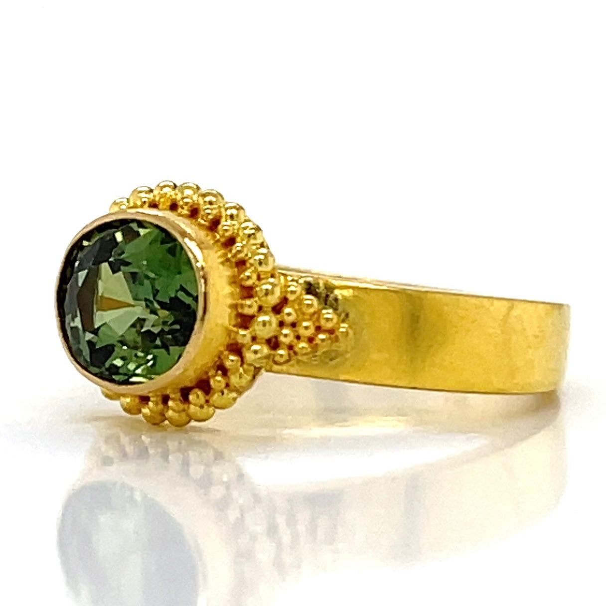 Green oval sapphire ring