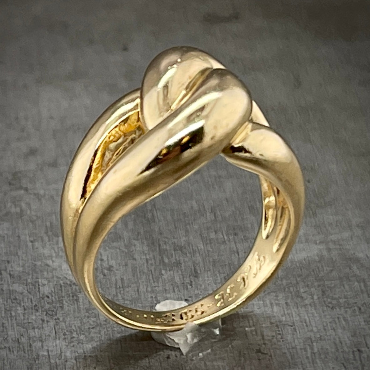 Aerial view of Knot Ring. Here you can better see the engraving on the inside band of the ring.