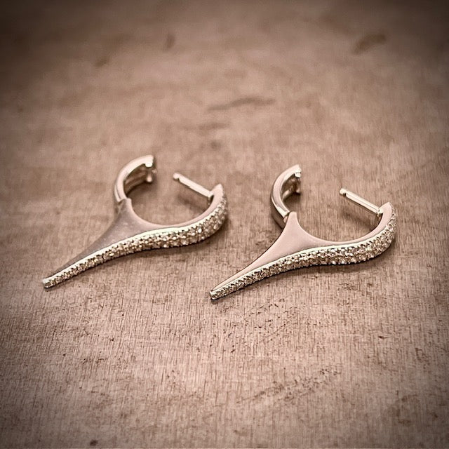 Angled View of White Gold Diamond Drop Earrings , with back lever of Earring Open