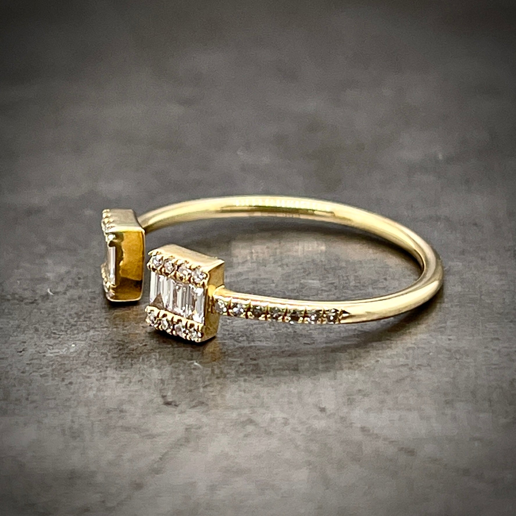 3/4 profile of yellow gold negative space ring.