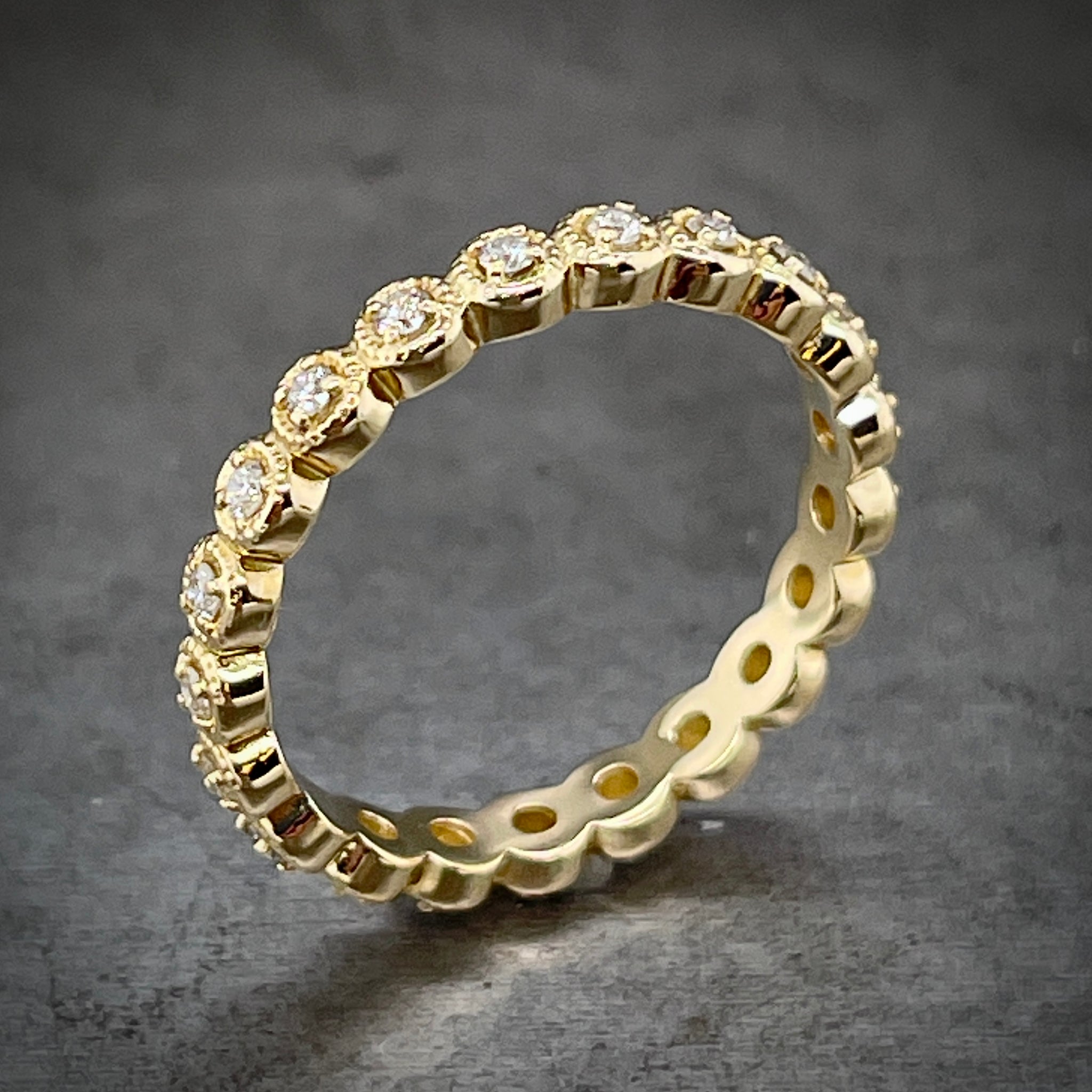 Angled aerial view of diamond eternity band.