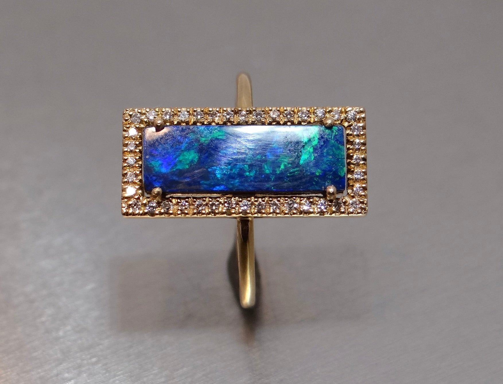 Opal Ring with Diamond Halo