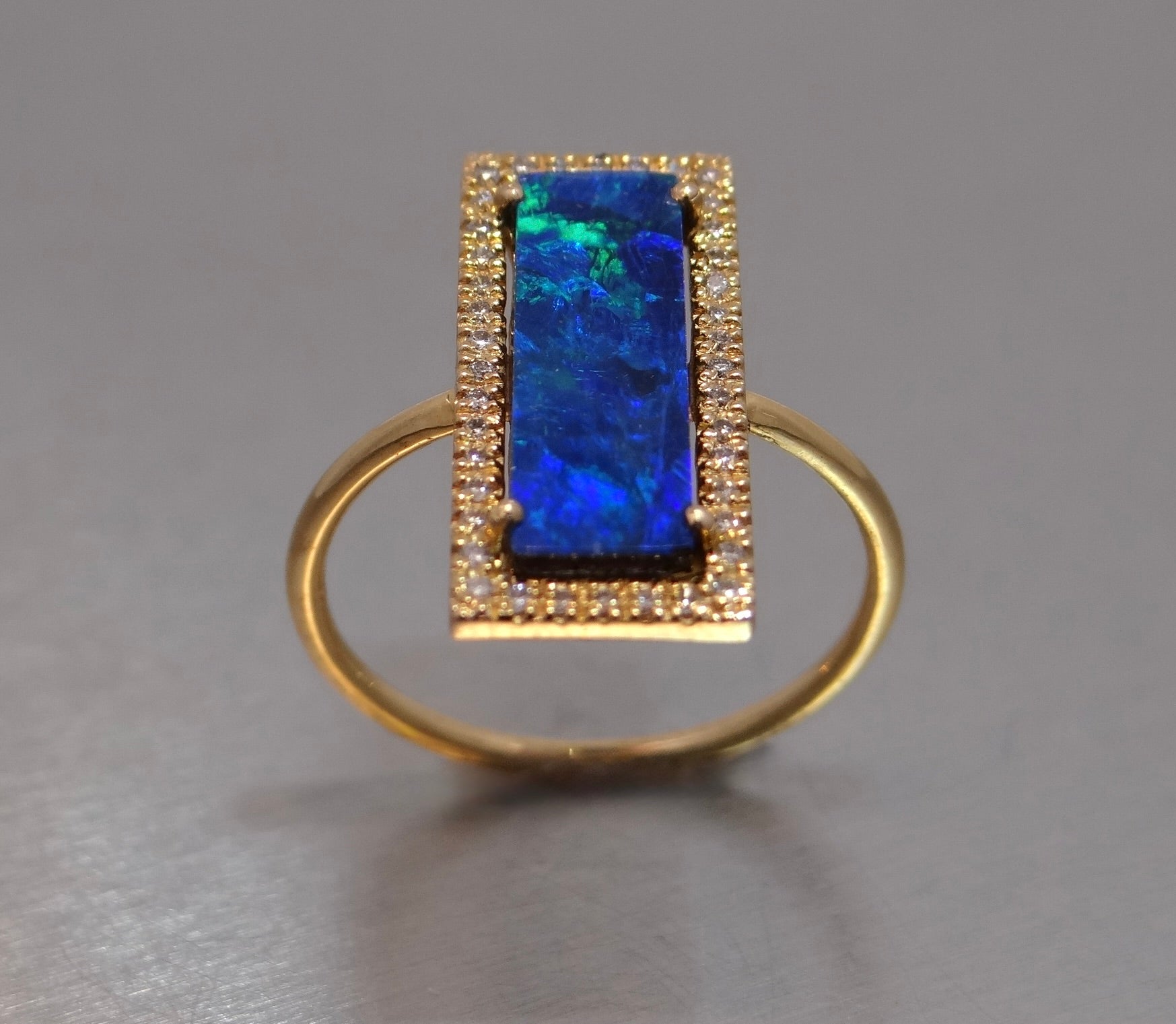 Opal Ring with Diamond Halo