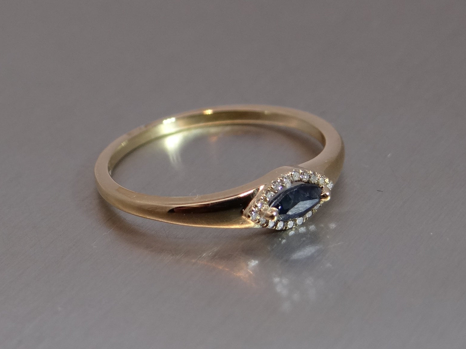 Sapphire ring with Diamond halo