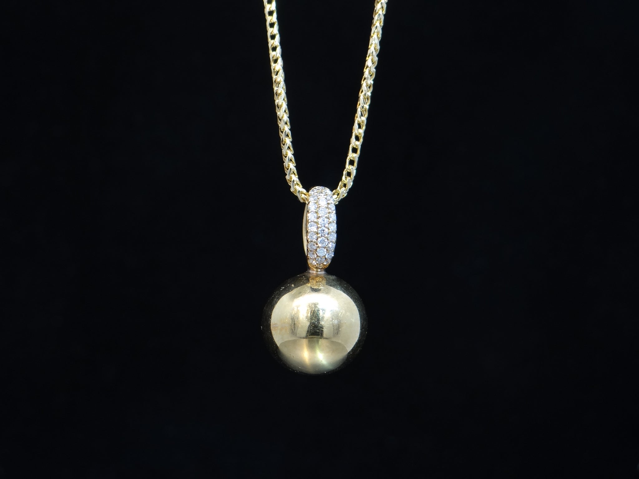 Gold Ball Pendant with a Diamond Accented Bail
