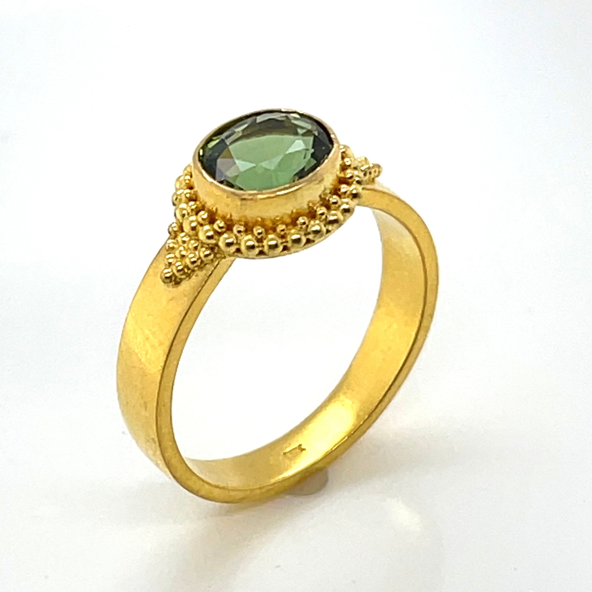 Green oval sapphire ring