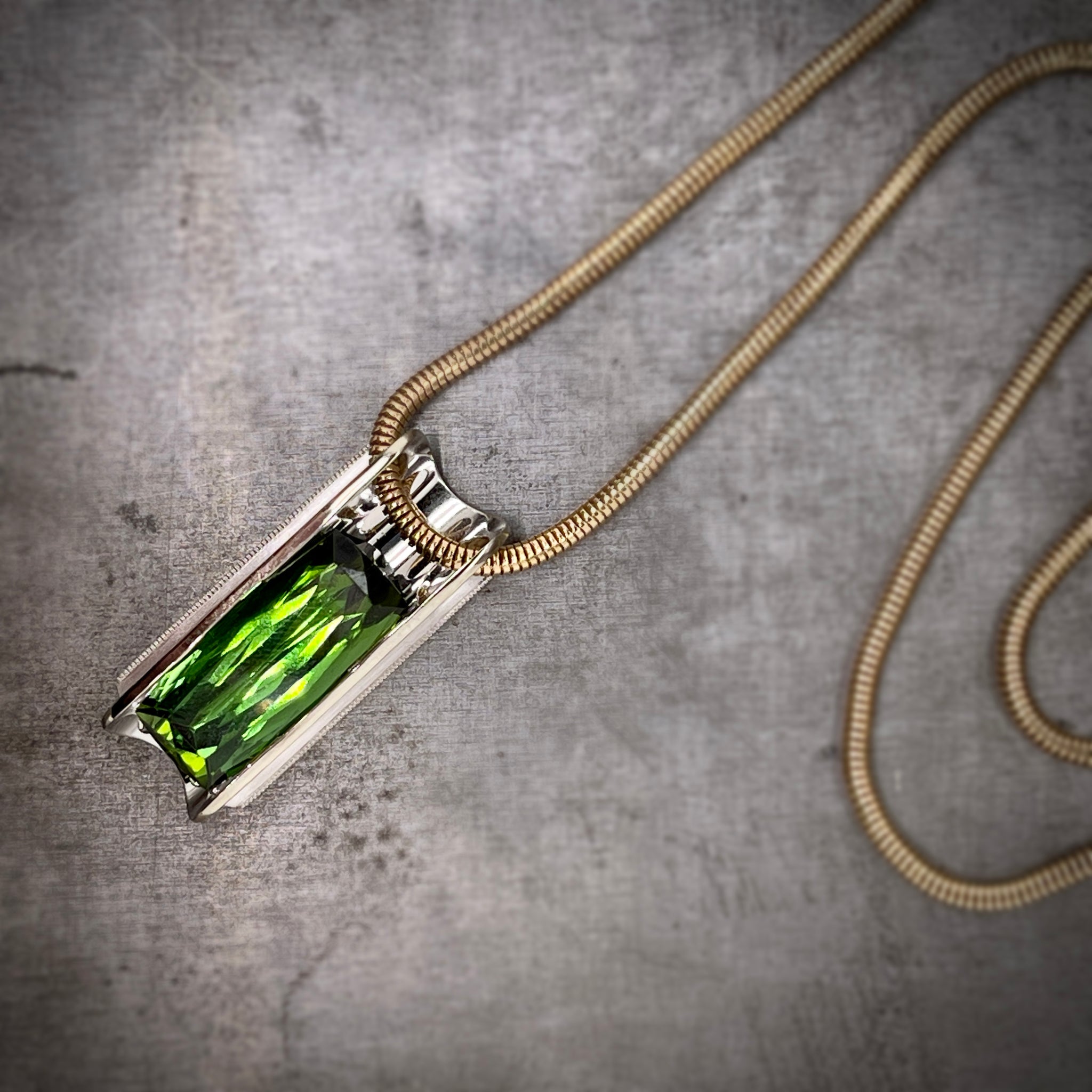 Front View of 14k White Gold Green Tourmaline Pendant on Yellow Gold Chain