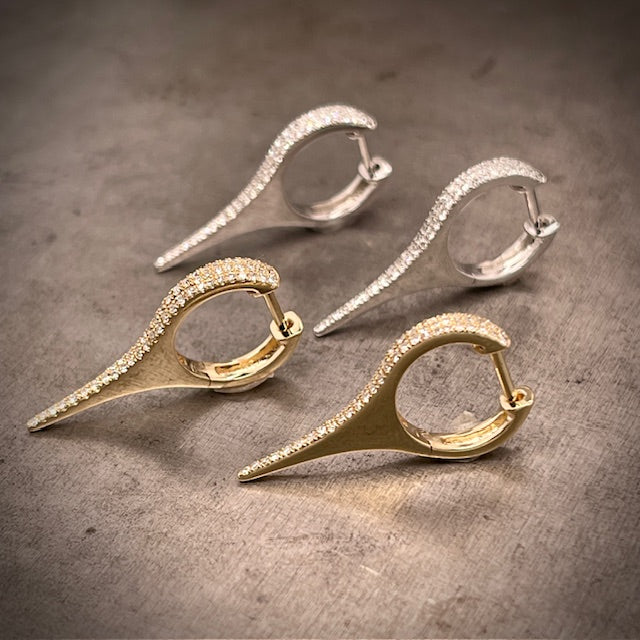 Angled Side View of14k Gold Diamond Drop Earrings in 14k Yellow and White Gold